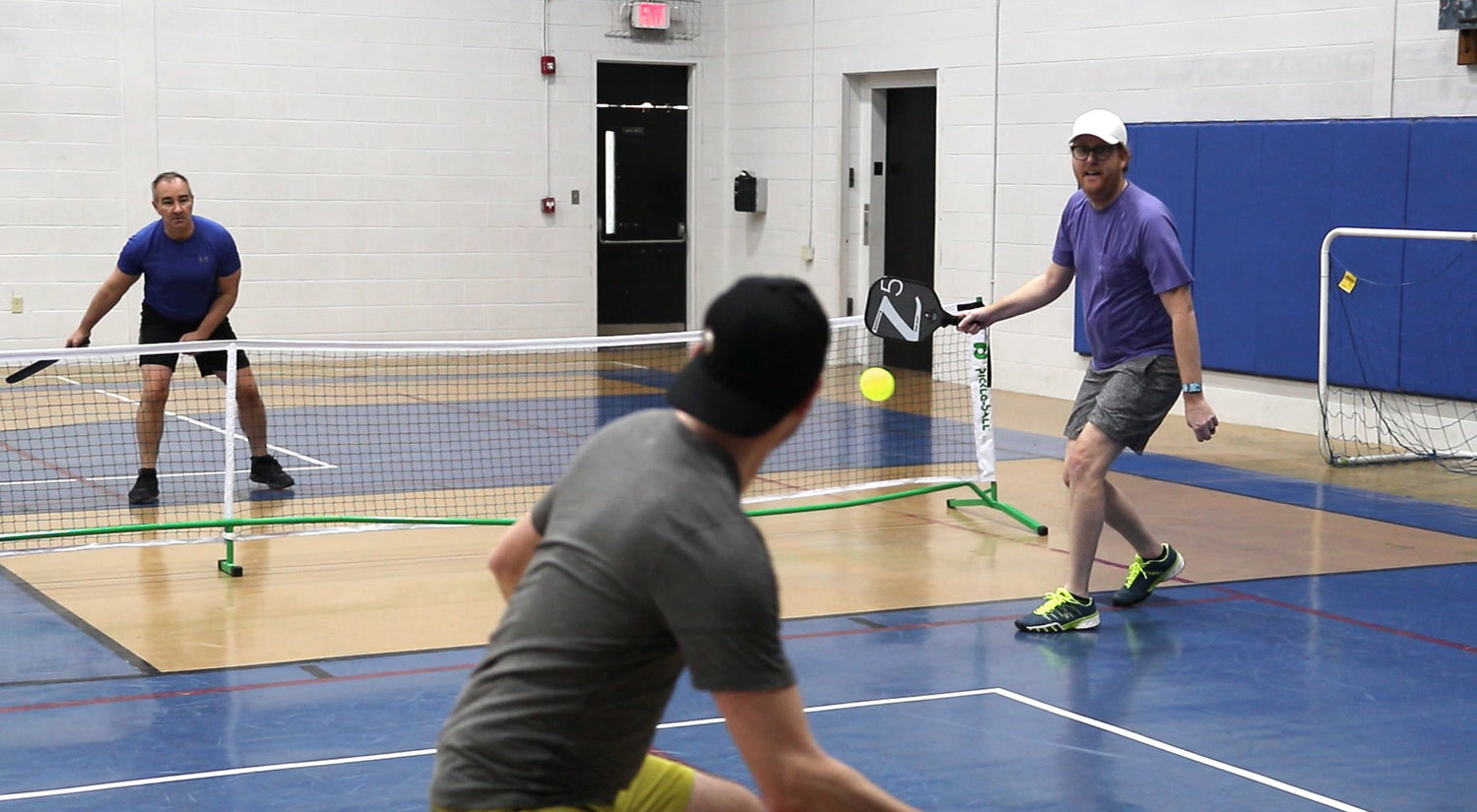 Early-morning pickleball players.